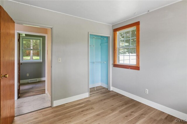 2129 Berry Rd, Lafayette, NY 13084 - empty room with baseboards and light wood-style floors