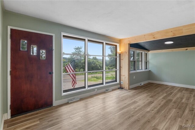 2129 Berry Rd, Lafayette, NY 13084 - entryway with wood finished floors and ornamental molding