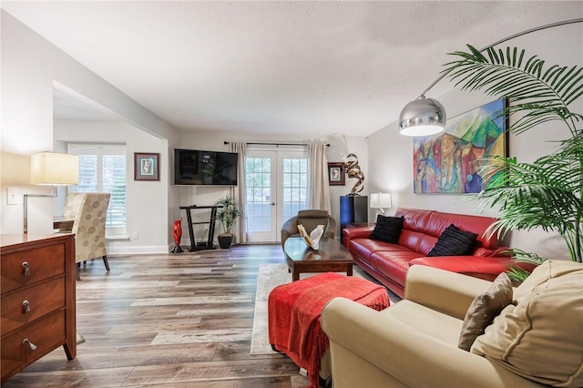 42 Wood Creek Dr, Pittsford, NY 14534 - living area with wood finished floors and french doors