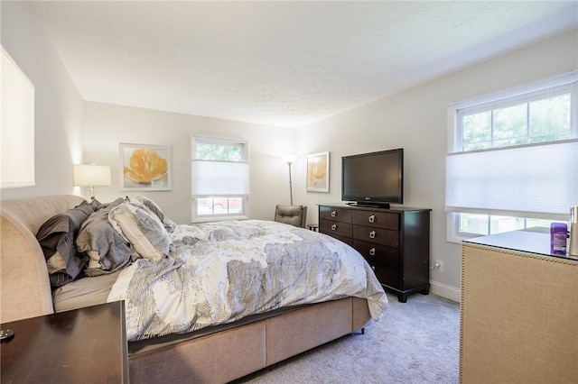 42 Wood Creek Dr, Pittsford, NY 14534 - bedroom featuring light colored carpet and baseboards