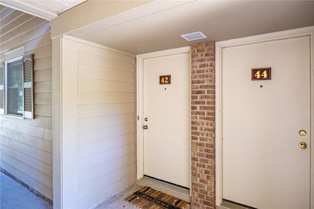 42 Wood Creek Dr, Pittsford, NY 14534 - entrance to property featuring brick siding