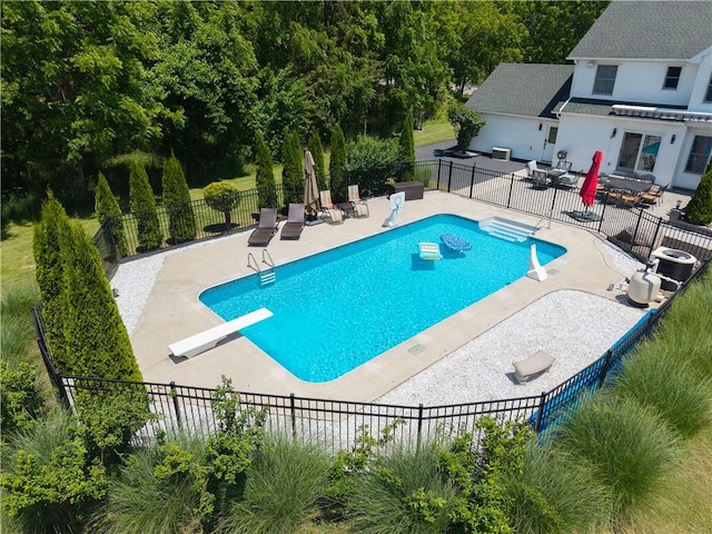 255 Watson Rd, Perinton, NY 14450 - view of pool with a diving board and a patio area