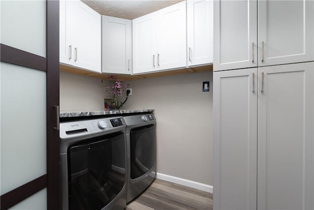 255 Watson Rd, Perinton, NY 14450 - laundry room with cabinet space, separate washer and dryer, and light wood finished floors