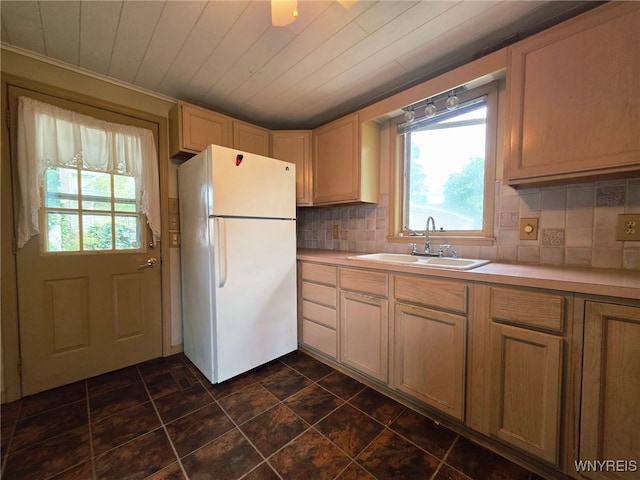942 N 4th St, Olean, NY 14760 - kitchen featuring freestanding refrigerator, light countertops, backsplash, dark stone finish flooring, and wooden ceiling