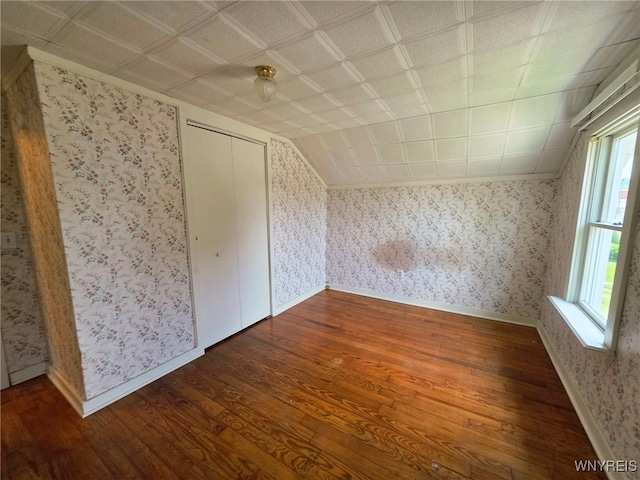 942 N 4th St, Olean, NY 14760 - bonus room with wood finished floors, wallpapered walls, and lofted ceiling