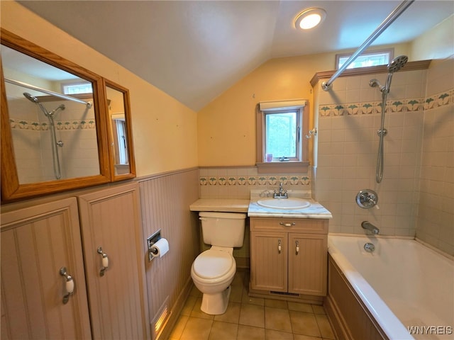 942 N 4th St, Olean, NY 14760 - full bathroom featuring lofted ceiling, vanity, tile patterned flooring, washtub / shower combination, and a wainscoted wall