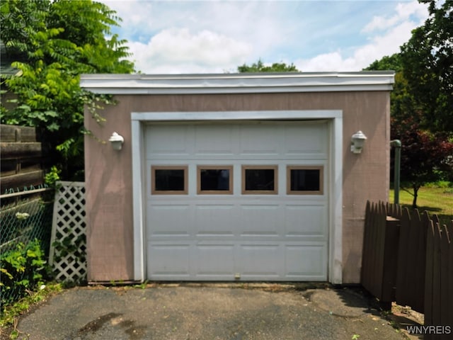 942 N 4th St, Olean, NY 14760 - garage featuring asphalt driveway