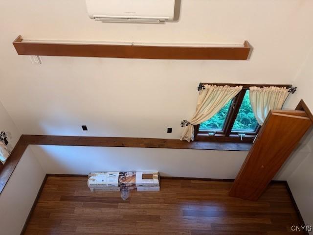 2033 Artemis Dr, Virgil, NY 13045 - stairway featuring wood finished floors and a wall mounted air conditioner