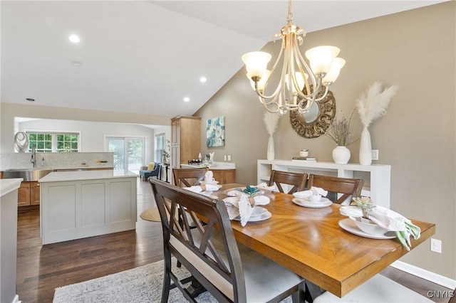 9545 Horseshoe Island Rd, Clay, NY 13041 - dining area with dark wood-style flooring, a chandelier, recessed lighting, and vaulted ceiling