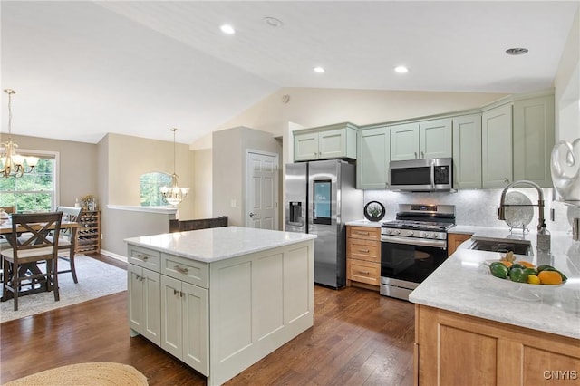 9545 Horseshoe Island Rd, Clay, NY 13041 - kitchen with appliances with stainless steel finishes, a chandelier, vaulted ceiling, decorative light fixtures, and recessed lighting