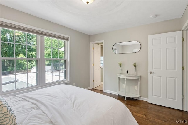 9545 Horseshoe Island Rd, Clay, NY 13041 - bedroom with dark wood-type flooring and baseboards