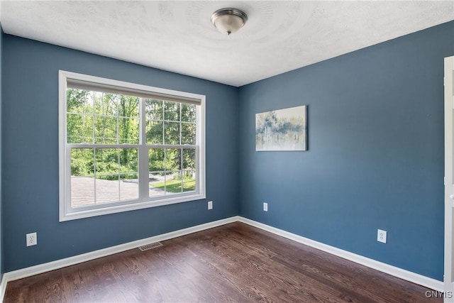 9545 Horseshoe Island Rd, Clay, NY 13041 - unfurnished room featuring dark wood finished floors and baseboards