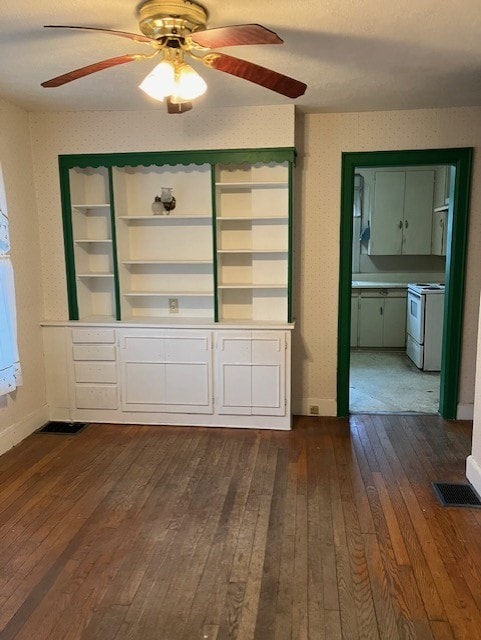 81 Silver St, Norwich, NY 13815 - unfurnished dining area featuring dark wood-style floors and ceiling fan
