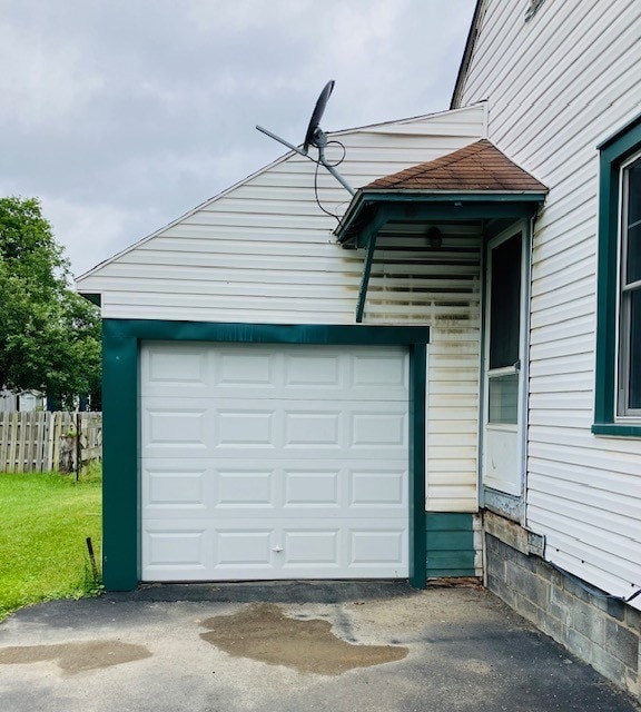 81 Silver St, Norwich, NY 13815 - garage featuring asphalt driveway