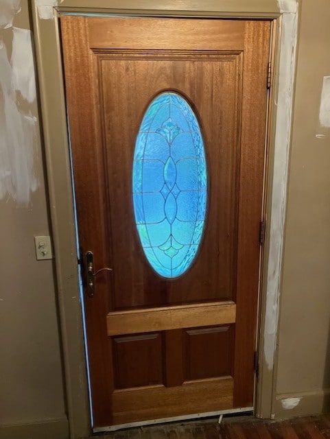 81 Silver St, Norwich, NY 13815 - entryway featuring dark wood-type flooring