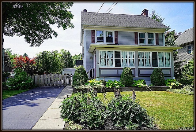 57 Dudley Ave, Hamburg, NY 14075 - traditional style home with driveway and a chimney
