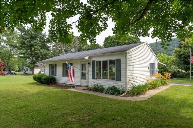 21 Twin Dr, North Dansville, NY 14437 - single story home with a front lawn