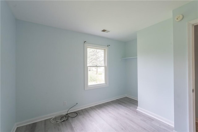 21 Twin Dr, North Dansville, NY 14437 - spare room featuring wood finished floors and a smoke detector