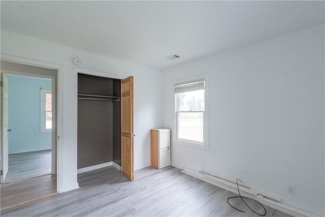 21 Twin Dr, North Dansville, NY 14437 - unfurnished bedroom featuring light wood-type flooring and a closet