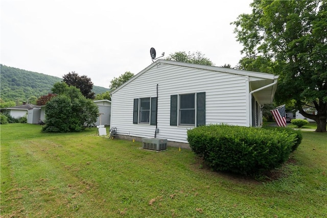 21 Twin Dr, North Dansville, NY 14437 - view of property exterior featuring a yard