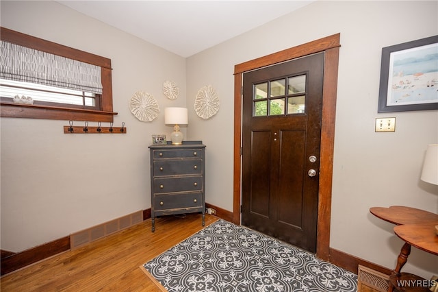 128 Argonne Dr, Tonawanda, NY 14217 - foyer with wood finished floors and baseboards