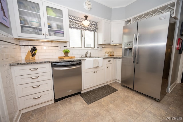 128 Argonne Dr, Tonawanda, NY 14217 - kitchen featuring appliances with stainless steel finishes, stone countertops, backsplash, white cabinets, and glass insert cabinets