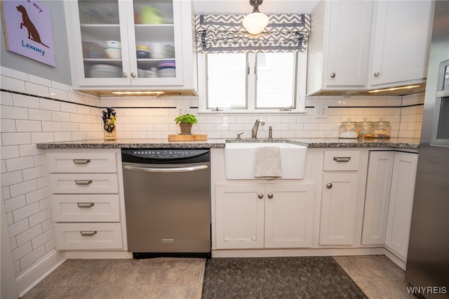 128 Argonne Dr, Tonawanda, NY 14217 - kitchen with dishwasher, stone countertops, white cabinets, and glass insert cabinets