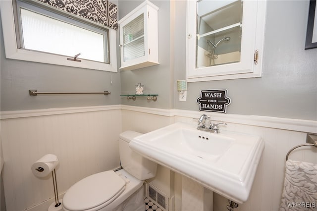 128 Argonne Dr, Tonawanda, NY 14217 - bathroom featuring wainscoting and toilet