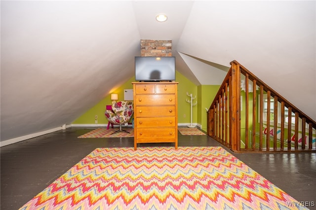 128 Argonne Dr, Tonawanda, NY 14217 - additional living space featuring lofted ceiling and baseboards