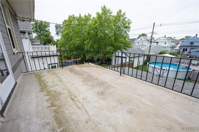 128 Argonne Dr, Tonawanda, NY 14217 - view of patio featuring a residential view and an outbuilding