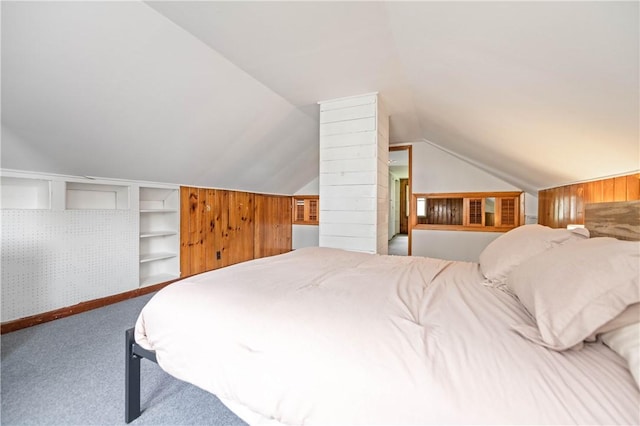 111 Hartsdale Rd, Irondequoit, NY 14622 - carpeted bedroom with vaulted ceiling and wood walls