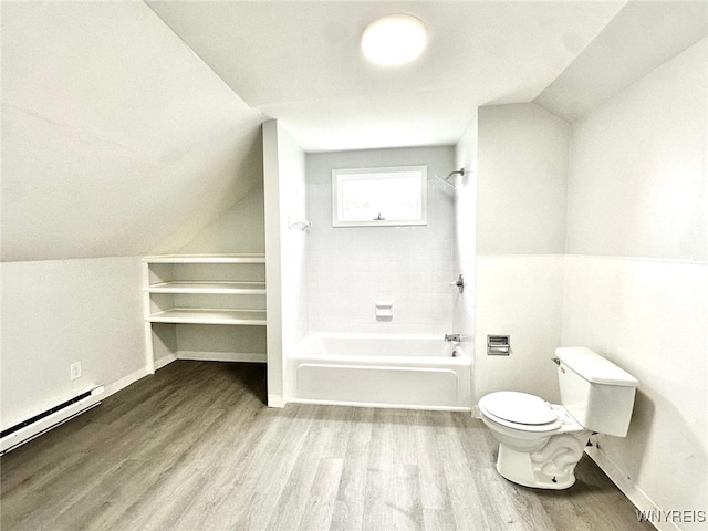 169 Davidson Ave, Buffalo, NY 14215 - bathroom with wood finished floors, shower / washtub combination, a baseboard heating unit, and vaulted ceiling