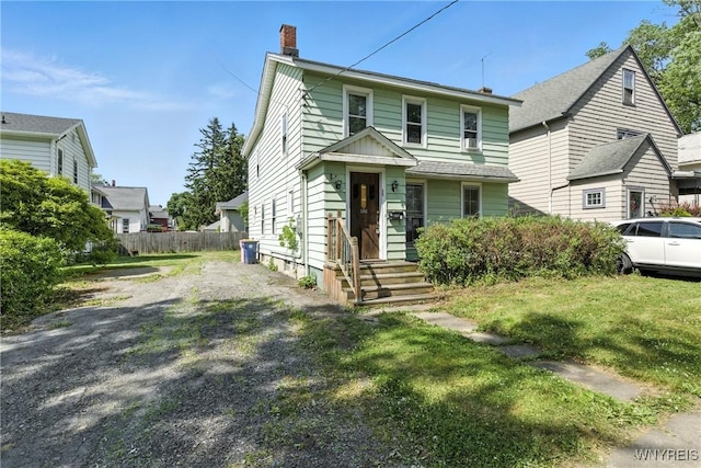 349 Willow St, Lockport City, NY 14094 - view of front of house featuring a chimney