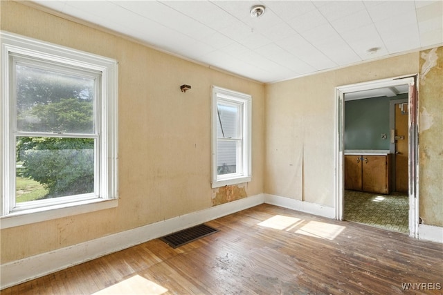 349 Willow St, Lockport City, NY 14094 - spare room with hardwood / wood-style floors and plenty of natural light