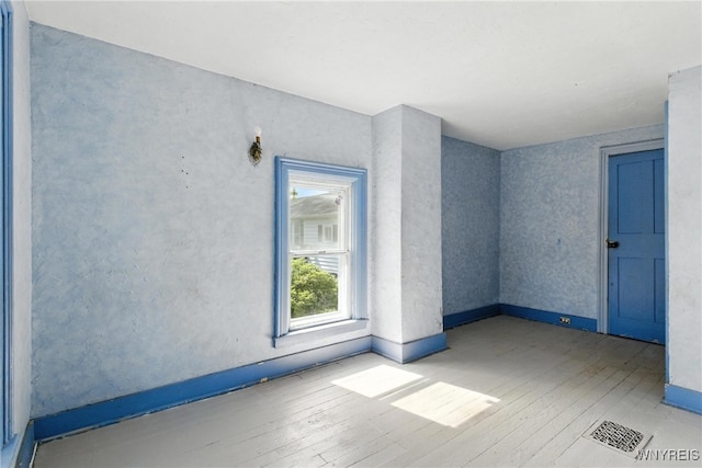 349 Willow St, Lockport City, NY 14094 - spare room with wood-type flooring