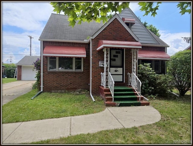 107 Singer Dr, West Seneca, NY 14224 - bungalow-style house with brick siding, a front yard, a detached garage, and roof with shingles