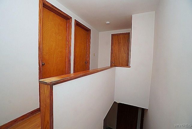 107 Singer Dr, West Seneca, NY 14224 - hallway with baseboards and wood finished floors