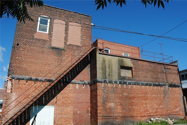 136 N Fraley St, Kane Boro, PA 16735 - view of side of home featuring brick siding