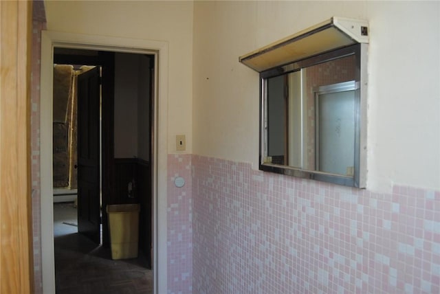 136 N Fraley St, Kane Boro, PA 16735 - corridor featuring a wainscoted wall and tile walls