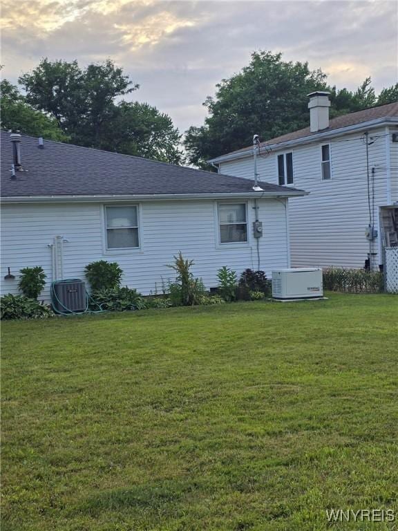 207 Shetland Dr, Amherst, NY 14221 - rear view of property featuring a lawn