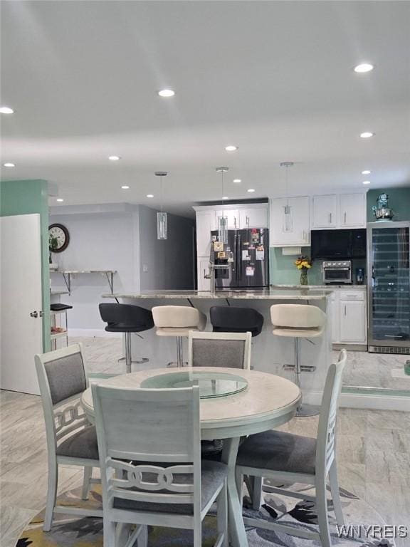 207 Shetland Dr, Amherst, NY 14221 - dining area featuring recessed lighting and wine cooler