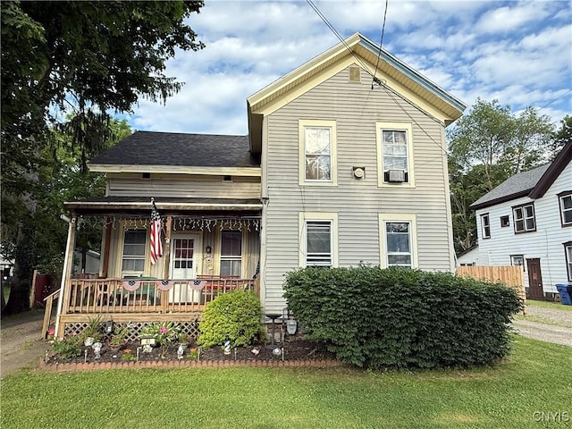 41 Owego St, Cortland, NY 13045 - view of front of house with covered porch and a front lawn