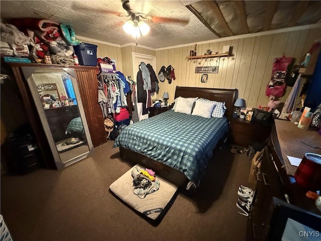 41 Owego St, Cortland, NY 13045 - bedroom featuring carpet, a ceiling fan, and wooden walls
