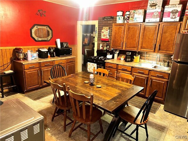 41 Owego St, Cortland, NY 13045 - dining area with wainscoting and wooden walls