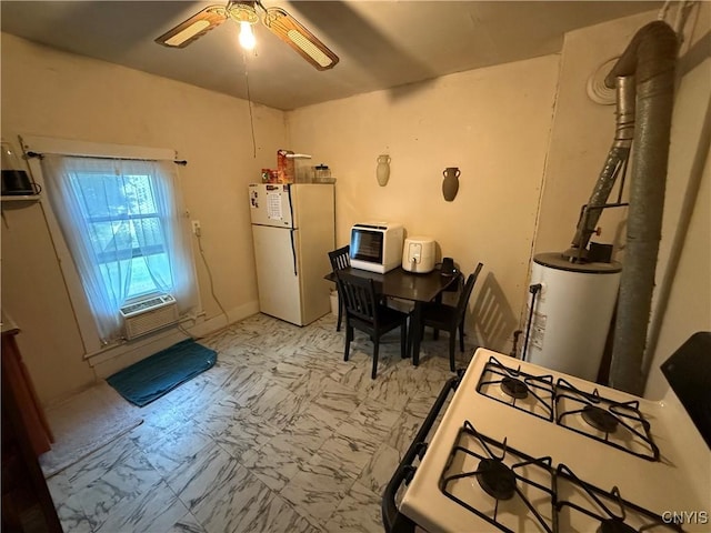 41 Owego St, Cortland, NY 13045 - kitchen with white appliances, a ceiling fan, and water heater