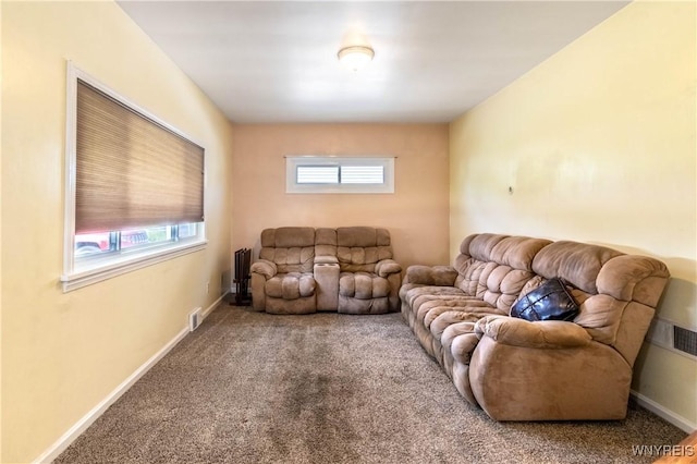 686 Harrison Ave, Tonawanda, NY 14223 - carpeted living area featuring radiator heating unit and baseboards