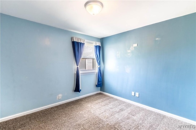 686 Harrison Ave, Tonawanda, NY 14223 - unfurnished room with carpet and baseboards