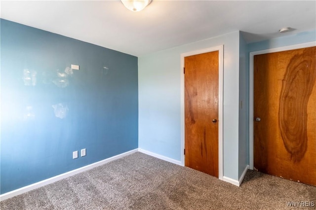 686 Harrison Ave, Tonawanda, NY 14223 - unfurnished bedroom with carpet flooring and a closet