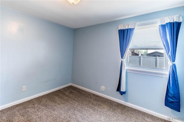 686 Harrison Ave, Tonawanda, NY 14223 - carpeted spare room with baseboards