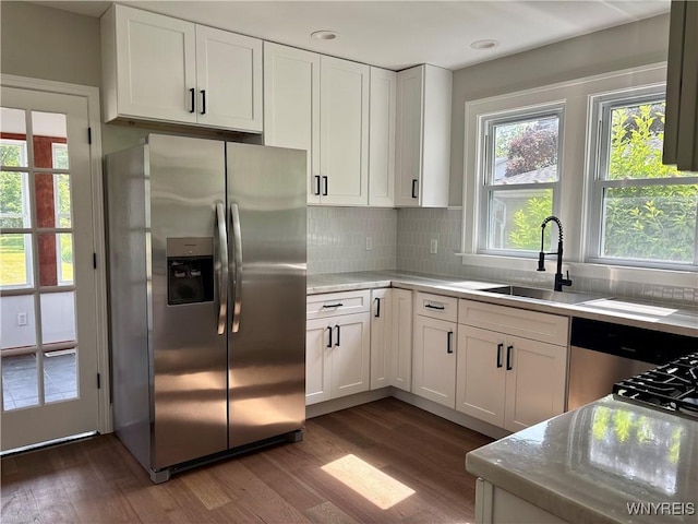 575 Willow Ave, North Tonawanda, NY 14120 - kitchen with stainless steel fridge, dark wood-style flooring, white cabinets, and recessed lighting